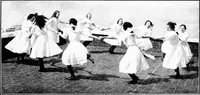 An illustration from Folk-dances and singing games; Dances of the people (1909)