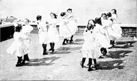 An illustration from Folk-dances and singing games; Dances of the people (1909)