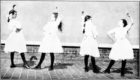 An illustration from Folk-dances and singing games; Dances of the people (1909)