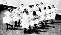 An illustration from Folk-dances and singing games; Dances of the people (1909)