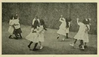 An illustration from Dances of the people : a second volume of Folk-dances and singing games; containing twenty-eight folk-dances of the United States, Ireland, England, Scotland, Norway, Sweden, Denmark, Finland, Germany, and Switzerland; with the music, full directions for performance and numerous illustrations (1913)