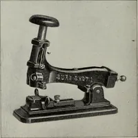 An illustration from Desk book of type specimens, borders, ornaments, brass rules and cuts : catalogue of printing machinery and printers' supplies (1900)