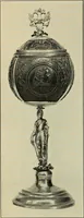 An illustration from Exhibition of national Russian art, 17th, 18th and early 19th centuries : peasant embroideries, costumes, headdresses, hand-woven materials, laces, ikons, articles of silver, copper, etc. (1900)