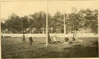 An illustration from The games of lawn hockey, tether ball, golf-croquet, hand tennis, volley ball, hand polo, wicket polo, laws of badminton, drawing room hockey, garden hockey (1903)