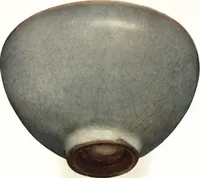 An illustration from Chinese pottery and porcelain: an account of the potter's art in China from primitive times to the present day...forty plates in colour and ninety-six in black and white (1915)