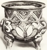 An illustration from Chinese pottery and porcelain: an account of the potter's art in China from primitive times to the present day...forty plates in colour and ninety-six in black and white (1915)