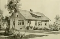An illustration from Guaranteed building plans with interior views and details : a standard collection of new, original and artistic designs of cottages, bungalows, residences and flats of frame, brick, cement, plaster, concrete blocks, hollow tile, stucco, etc. and farm buildings of all descriptions together with interior and exterior details and interior views arranged and described by William A. Radford. (1915)