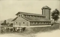 An illustration from Guaranteed building plans with interior views and details : a standard collection of new, original and artistic designs of cottages, bungalows, residences and flats of frame, brick, cement, plaster, concrete blocks, hollow tile, stucco, etc. and farm buildings of all descriptions together with interior and exterior details and interior views arranged and described by William A. Radford. (1915)