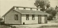 An illustration from Guaranteed building plans with interior views and details : a standard collection of new, original and artistic designs of cottages, bungalows, residences and flats of frame, brick, cement, plaster, concrete blocks, hollow tile, stucco, etc. and farm buildings of all descriptions together with interior and exterior details and interior views arranged and described by William A. Radford. (1915)