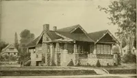 An illustration from Guaranteed building plans with interior views and details : a standard collection of new, original and artistic designs of cottages, bungalows, residences and flats of frame, brick, cement, plaster, concrete blocks, hollow tile, stucco, etc. and farm buildings of all descriptions together with interior and exterior details and interior views arranged and described by William A. Radford. (1915)