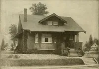 An illustration from Guaranteed building plans with interior views and details : a standard collection of new, original and artistic designs of cottages, bungalows, residences and flats of frame, brick, cement, plaster, concrete blocks, hollow tile, stucco, etc. and farm buildings of all descriptions together with interior and exterior details and interior views arranged and described by William A. Radford. (1915)