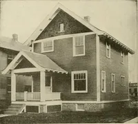 An illustration from Guaranteed building plans with interior views and details : a standard collection of new, original and artistic designs of cottages, bungalows, residences and flats of frame, brick, cement, plaster, concrete blocks, hollow tile, stucco, etc. and farm buildings of all descriptions together with interior and exterior details and interior views arranged and described by William A. Radford. (1915)