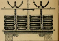 An illustration from Handbuch der Farbenfabrikation. Lehrbuch der Fabrikation, Untersuchung und Verwendung aller in der Praxis vorkommenden Körperfarben (1922)