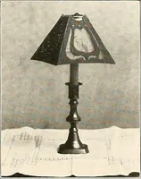 An illustration from Handicraft for girls; a tentative course in needlework, basketry, designing, paper and cardboard construction, textile fibers and fabrics and home decoration and care, designed for use in schools and homes (1910)