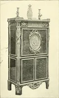 An illustration from An historical guide to French interiors, furniture, decoration, woodwork, & allied arts during the last half of the seventeenth century, the whole of the eighteenth century, and the earlier part of the nineteenth (1900)
