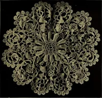 An illustration from A history of hand-made lace : Dealing with the origin of lace, the growth of the great lace centres, the mode of manufacture, the methods of distinguishing and the care of various kinds of lace ... (1900)