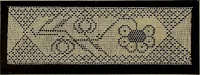 An illustration from A history of hand-made lace : Dealing with the origin of lace, the growth of the great lace centres, the mode of manufacture, the methods of distinguishing and the care of various kinds of lace ... (1900)