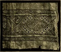 An illustration from A history of hand-made lace : Dealing with the origin of lace, the growth of the great lace centres, the mode of manufacture, the methods of distinguishing and the care of various kinds of lace ... (1900)