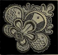 An illustration from A history of hand-made lace : Dealing with the origin of lace, the growth of the great lace centres, the mode of manufacture, the methods of distinguishing and the care of various kinds of lace ... (1900)