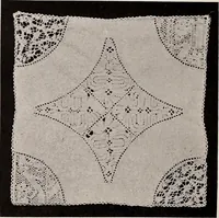 An illustration from A history of hand-made lace : dealing with the origin of lace, the growth of the great lace centres, the mode of manufacture, the methods of distinguishing and the care of various kinds of lace (1900)