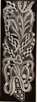 An illustration from A history of hand-made lace : dealing with the origin of lace, the growth of the great lace centres, the mode of manufacture, the methods of distinguishing and the care of various kinds of lace (1900)