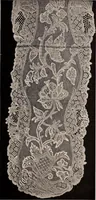 An illustration from A history of hand-made lace : dealing with the origin of lace, the growth of the great lace centres, the mode of manufacture, the methods of distinguishing and the care of various kinds of lace (1900)