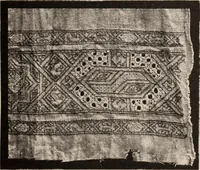 An illustration from A history of hand-made lace : dealing with the origin of lace, the growth of the great lace centres, the mode of manufacture, the methods of distinguishing and the care of various kinds of lace (1900)