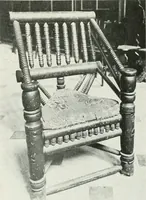 An illustration from A history of oak furniture (1920)