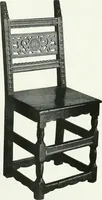 An illustration from A history of oak furniture (1920)