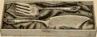 An illustration from Holiday specialties : jewelry, watches, silverware, musical goods, leather goods, sporting goods, etc. (1900)