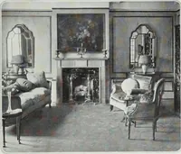 An illustration from House & garden's book of interiors, containing over three hundred illustrations of living rooms, dining rooms, libraries, halls, bedrooms, porches, breakfast rooms, nurseries, kitchens, bathrooms and the use of decorative accessories and curtains, together with practical suggestions for the furnishing and decorating of each type of room in the house (1920)