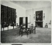 An illustration from House & garden's book of interiors, containing over three hundred illustrations of living rooms, dining rooms, libraries, halls, bedrooms, porches, breakfast rooms, nurseries, kitchens, bathrooms and the use of decorative accessories and curtains, together with practical suggestions for the furnishing and decorating of each type of room in the house (1920)