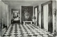 An illustration from House & garden's book of interiors, containing over three hundred illustrations of living rooms, dining rooms, libraries, halls, bedrooms, porches, breakfast rooms, nurseries, kitchens, bathrooms and the use of decorative accessories and curtains, together with practical suggestions for the furnishing and decorating of each type of room in the house (1920)