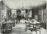 An illustration from House & garden's book of interiors, containing over three hundred illustrations of living rooms, dining rooms, libraries, halls, bedrooms, porches, breakfast rooms, nurseries, kitchens, bathrooms and the use of decorative accessories and curtains, together with practical suggestions for the furnishing and decorating of each type of room in the house (1920)