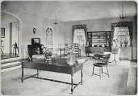 An illustration from House & garden's book of interiors, containing over three hundred illustrations of living rooms, dining rooms, libraries, halls, bedrooms, porches, breakfast rooms, nurseries, kitchens, bathrooms and the use of decorative accessories and curtains, together with practical suggestions for the furnishing and decorating of each type of room in the house (1920)
