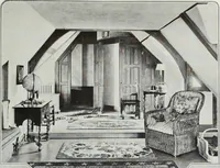 An illustration from House & garden's book of interiors, containing over three hundred illustrations of living rooms, dining rooms, libraries, halls, bedrooms, porches, breakfast rooms, nurseries, kitchens, bathrooms and the use of decorative accessories and curtains, together with practical suggestions for the furnishing and decorating of each type of room in the house (1920)