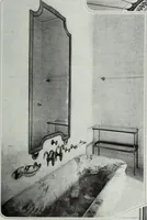 An illustration from House & garden's book of interiors, containing over three hundred illustrations of living rooms, dining rooms, libraries, halls, bedrooms, porches, breakfast rooms, nurseries, kitchens, bathrooms and the use of decorative accessories and curtains, together with practical suggestions for the furnishing and decorating of each type of room in the house (1920)