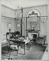 An illustration from House & garden's book of interiors, containing over three hundred illustrations of living rooms, dining rooms, libraries, halls, bedrooms, porches, breakfast rooms, nurseries, kitchens, bathrooms and the use of decorative accessories and curtains, together with practical suggestions for the furnishing and decorating of each type of room in the house (1920)