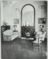 An illustration from House & garden's book of interiors, containing over three hundred illustrations of living rooms, dining rooms, libraries, halls, bedrooms, porches, breakfast rooms, nurseries, kitchens, bathrooms and the use of decorative accessories and curtains, together with practical suggestions for the furnishing and decorating of each type of room in the house (1920)