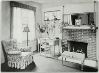 An illustration from House & garden's book of interiors, containing over three hundred illustrations of living rooms, dining rooms, libraries, halls, bedrooms, porches, breakfast rooms, nurseries, kitchens, bathrooms and the use of decorative accessories and curtains, together with practical suggestions for the furnishing and decorating of each type of room in the house (1920)