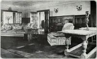 An illustration from House & garden's book of interiors, containing over three hundred illustrations of living rooms, dining rooms, libraries, halls, bedrooms, porches, breakfast rooms, nurseries, kitchens, bathrooms and the use of decorative accessories and curtains, together with practical suggestions for the furnishing and decorating of each type of room in the house (1920)