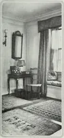 An illustration from House & garden's book of interiors, containing over three hundred illustrations of living rooms, dining rooms, libraries, halls, bedrooms, porches, breakfast rooms, nurseries, kitchens, bathrooms and the use of decorative accessories and curtains, together with practical suggestions for the furnishing and decorating of each type of room in the house (1920)