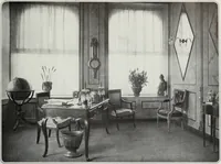 An illustration from House & garden's book of interiors, containing over three hundred illustrations of living rooms, dining rooms, libraries, halls, bedrooms, porches, breakfast rooms, nurseries, kitchens, bathrooms and the use of decorative accessories and curtains, together with practical suggestions for the furnishing and decorating of each type of room in the house (1920)
