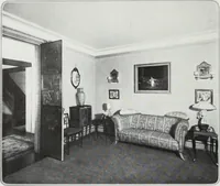 An illustration from House & garden's book of interiors, containing over three hundred illustrations of living rooms, dining rooms, libraries, halls, bedrooms, porches, breakfast rooms, nurseries, kitchens, bathrooms and the use of decorative accessories and curtains, together with practical suggestions for the furnishing and decorating of each type of room in the house (1920)