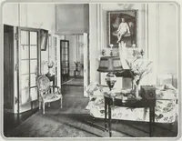 An illustration from House & garden's book of interiors, containing over three hundred illustrations of living rooms, dining rooms, libraries, halls, bedrooms, porches, breakfast rooms, nurseries, kitchens, bathrooms and the use of decorative accessories and curtains, together with practical suggestions for the furnishing and decorating of each type of room in the house (1920)