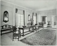 An illustration from House & garden's book of interiors, containing over three hundred illustrations of living rooms, dining rooms, libraries, halls, bedrooms, porches, breakfast rooms, nurseries, kitchens, bathrooms and the use of decorative accessories and curtains, together with practical suggestions for the furnishing and decorating of each type of room in the house (1920)