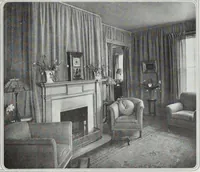 An illustration from House & garden's book of interiors, containing over three hundred illustrations of living rooms, dining rooms, libraries, halls, bedrooms, porches, breakfast rooms, nurseries, kitchens, bathrooms and the use of decorative accessories and curtains, together with practical suggestions for the furnishing and decorating of each type of room in the house (1920)