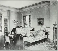 An illustration from House & garden's book of interiors, containing over three hundred illustrations of living rooms, dining rooms, libraries, halls, bedrooms, porches, breakfast rooms, nurseries, kitchens, bathrooms and the use of decorative accessories and curtains, together with practical suggestions for the furnishing and decorating of each type of room in the house (1920)