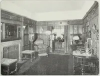 An illustration from House & garden's book of interiors, containing over three hundred illustrations of living rooms, dining rooms, libraries, halls, bedrooms, porches, breakfast rooms, nurseries, kitchens, bathrooms and the use of decorative accessories and curtains, together with practical suggestions for the furnishing and decorating of each type of room in the house (1920)