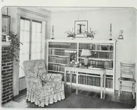 An illustration from House & garden's book of interiors, containing over three hundred illustrations of living rooms, dining rooms, libraries, halls, bedrooms, porches, breakfast rooms, nurseries, kitchens, bathrooms and the use of decorative accessories and curtains, together with practical suggestions for the furnishing and decorating of each type of room in the house (1920)